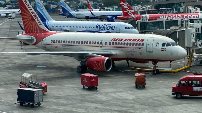 Bank executive ‘urinated’ on plane passenger